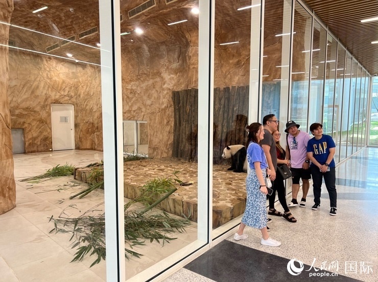 當(dāng)?shù)赜慰团c“四?！焙嫌啊Ｈ嗣窬W(wǎng)記者 張志文攝