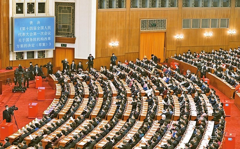 2023年3月10日，十四屆全國人大一次會議在北京人民大會堂舉行第三次全體會議，表決通過了關(guān)于國務院機構(gòu)改革方案的決定。圖為會議現(xiàn)場。 新華社記者 岳月偉/攝