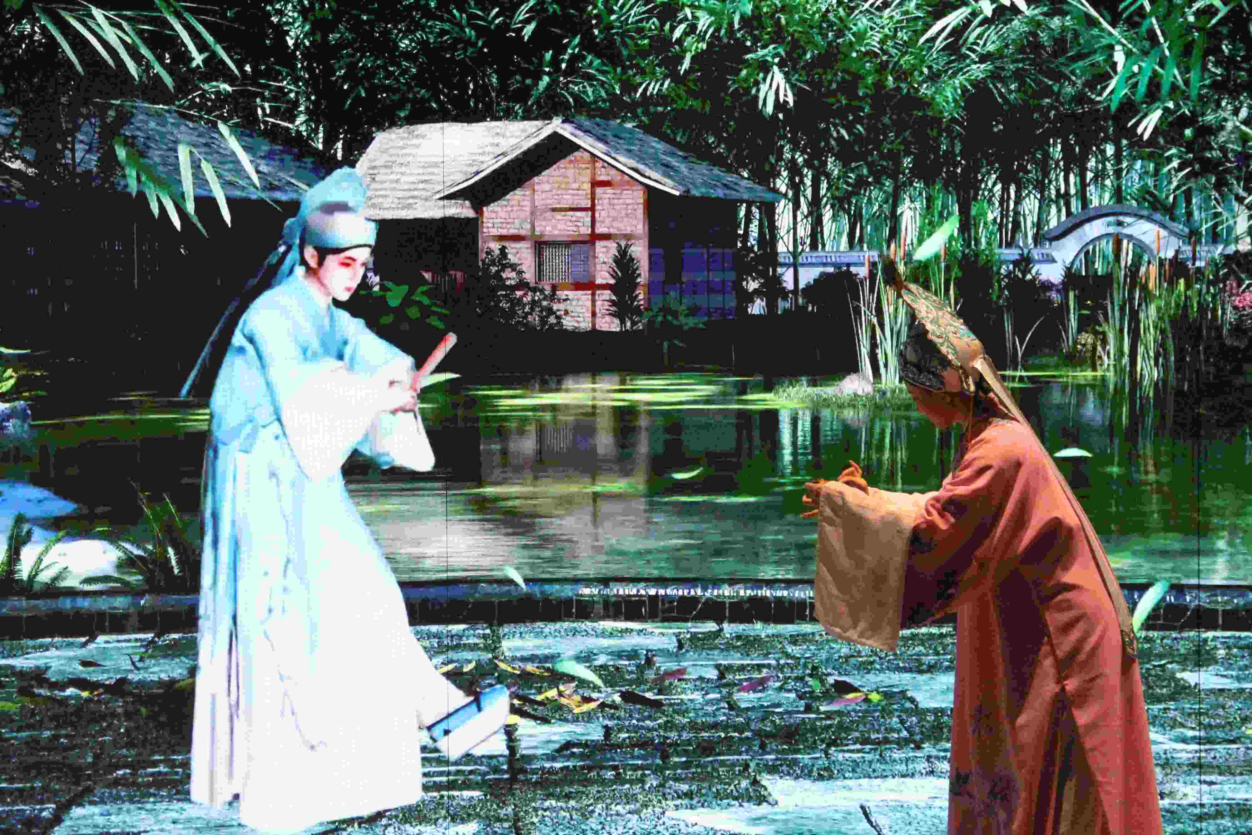 真人演員與虛擬人演員在“元啟金陵”南京數(shù)字文化客廳出演《梁山伯與祝英臺》經(jīng)典選段。受訪者供圖