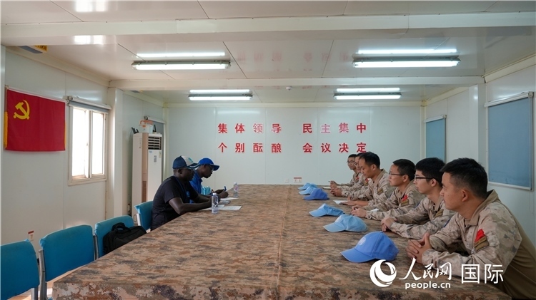 圖1 檢查組聽取工作匯報(bào)。王軍杰攝